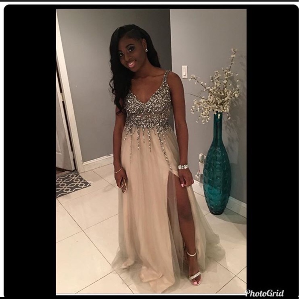 I’m selling a long backless dress with a split
